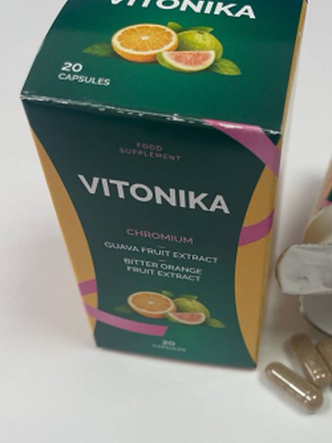 Кутия Vitonika и отворен флакон с капсули