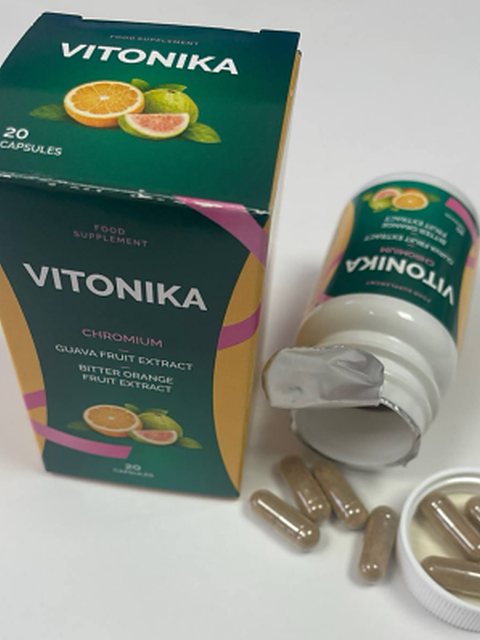 Otvorená dóza Vitonika s kapsulami a krabičkou